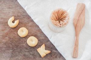 Cook alphabet biscuits with toothpicks photo