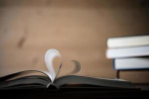 Pages of a book forming the shape of the heart photo