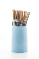 Cutlery holder with chopsticks, spoon and fork photo