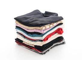 Folded garments on white background photo