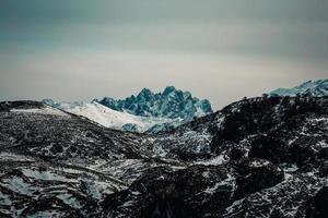Massive and risky peak in the mountain photo