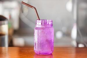Water in a purple jar photo