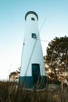 Beautiful white and blue lighthouse photo