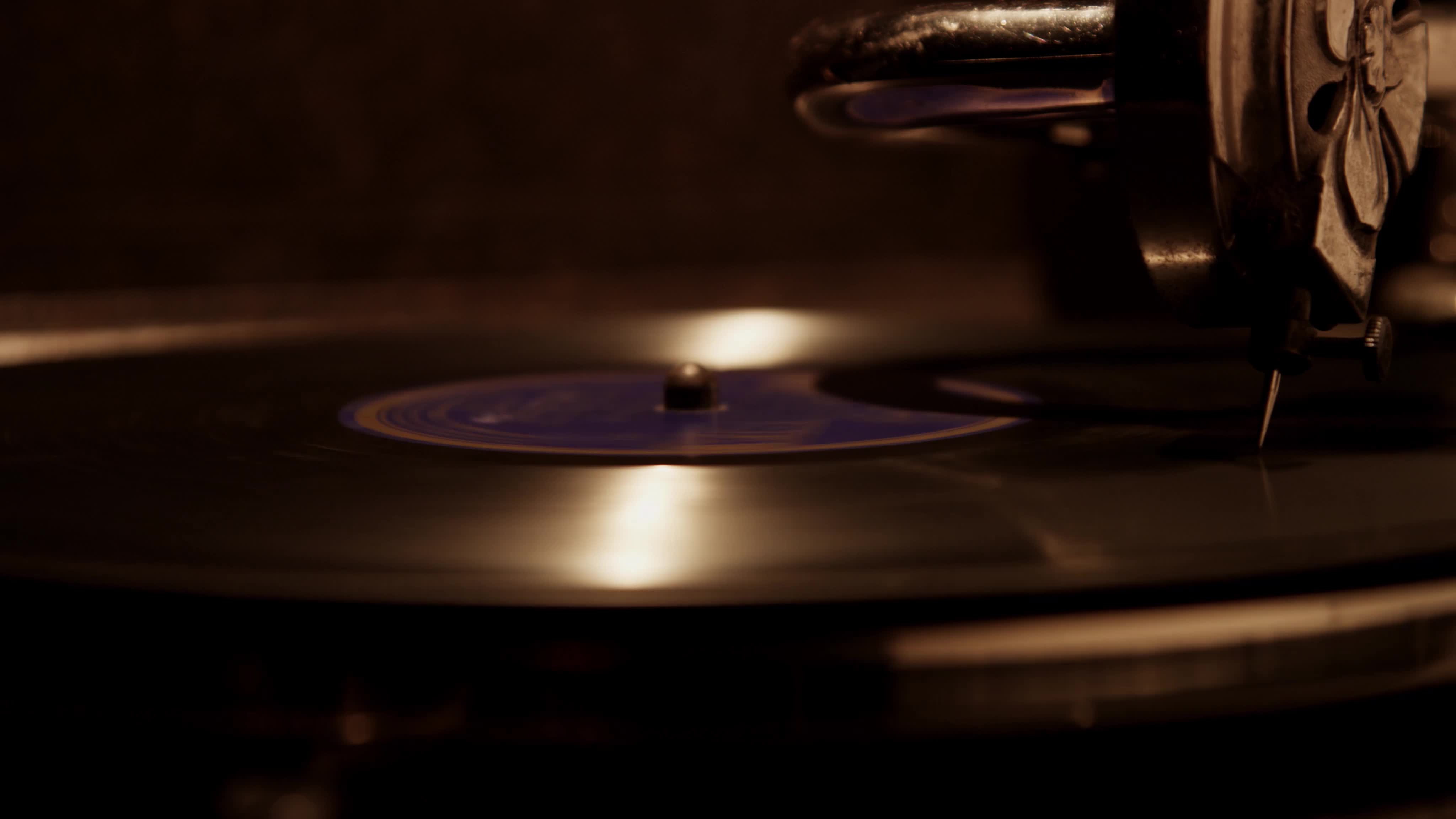 Extreme Close Up Of Decorated Needle Playing A Vinyl Disc On Old Record Player With Soft Overhead Lighting In 4k Free Hd Video Clips Stock Video Footage Extreme Close Up Of Decorated Needle Playing A Vinyl Disc On Old Record Player With Soft Overhead Lighting In 4k Free Hd Video Clips Stock Video Footage