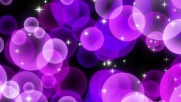 partículas de círculo brillante púrpura subiendo video