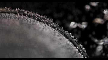 Detail of an aquarium with little static bubbles in foreground and blurred bubbles in background in 4K video