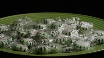 Rotating shot of spearmint hard candies - CANDY SPEARMINT 013 video