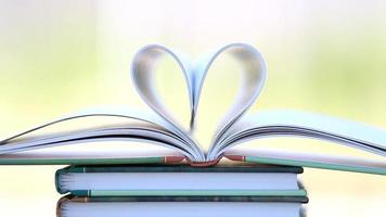 Book open in a heart shape video