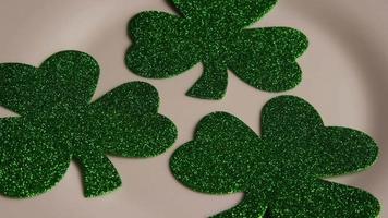 Rotating stock footage shot of St Patty's Day clovers on a white surface - ST PATTYS 005 video