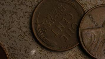 Rotating stock footage shot of American pennies coin - 0.01 - MONEY 0161 video