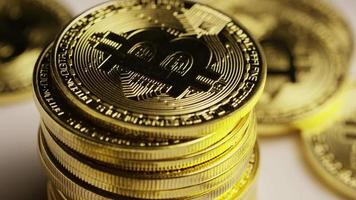 Rotating shot of Bitcoins digital cryptocurrency - BITCOIN 0180 video