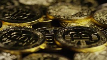 Rotating shot of Bitcoins digital cryptocurrency - BITCOIN 0605 video