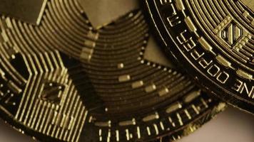 Rotating shot of Bitcoins digital cryptocurrency - BITCOIN MONERO 057 video