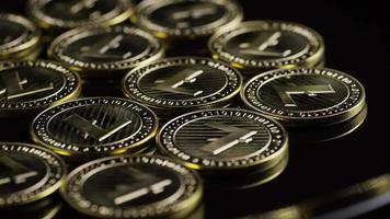 Rotating shot of Bitcoins digital cryptocurrency - BITCOIN LITECOIN 218 video