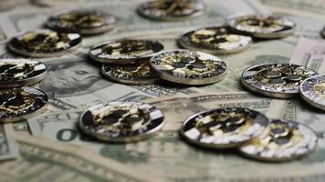 Rotating shot of Bitcoins digital cryptocurrency - BITCOIN RIPPLE 0247 video