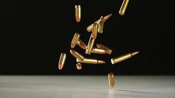 Bullets falling and bouncing in ultra slow motion 1,500 fps on a reflective surface - BULLETS PHANTOM 027 video