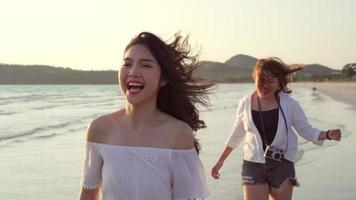 Beautiful women happy on the beach  video