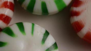 Rotating shot of spearmint hard candies - CANDY SPEARMINT 063 video