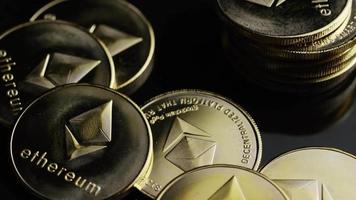 Rotating shot of Bitcoins digital cryptocurrency - BITCOIN ETHEREUM 174 video