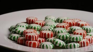 Rotating shot of spearmint hard candies - CANDY SPEARMINT 086 video