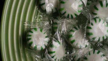 Rotating shot of spearmint hard candies - CANDY SPEARMINT 003 video