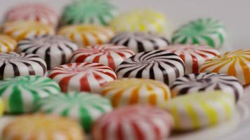 Rotating shot of a colorful mix of various hard candies - CANDY MIXED 029