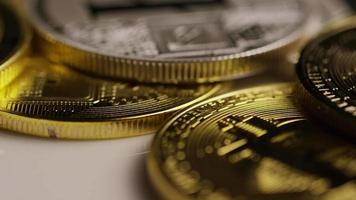 Rotating shot of Bitcoins digital cryptocurrency - BITCOIN MIXED 092 video