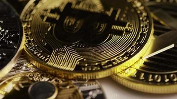 Rotating shot of Bitcoins digital cryptocurrency - BITCOIN MIXED 071 video