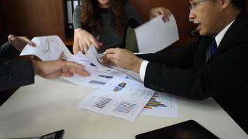 Top view of a business meeting with business charts. video