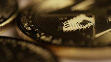 Rotating shot of Bitcoins digital cryptocurrency - BITCOIN MONERO 043 video