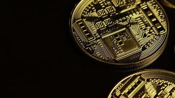Rotating shot of Bitcoins digital cryptocurrency - BITCOIN 0063 video