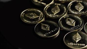 Rotating shot of Bitcoins digital cryptocurrency - BITCOIN ETHEREUM 114 video