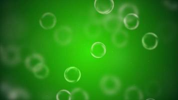 burbujas que fluyen sobre el fondo verde