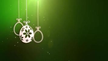 vrolijk pasen-papier hangende paaseieren geanimeerd met groene achtergrond. video