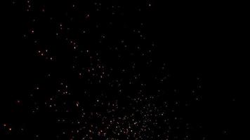 Relaxing soft pattern of fire embers on black background in 4K