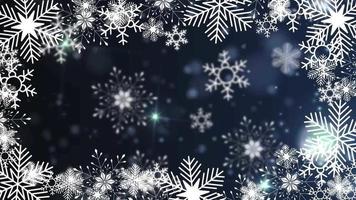 beautiful snowflakes rotating on a blue background lens flare bokeh video