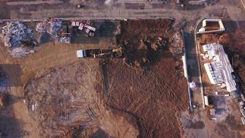 Digger loading a truck in 4K video