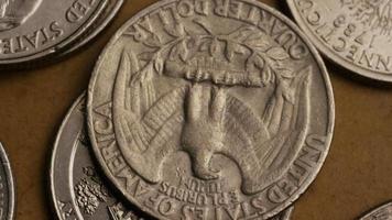 Rotating stock footage shot of American quarters coin - 0.25 - MONEY 0238 video