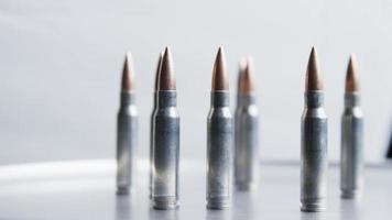 Cinematic rotating shot of bullets on a metallic surface - BULLETS 022 video