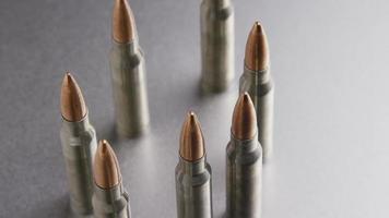 Cinematic rotating shot of bullets on a metallic surface - BULLETS 002 video