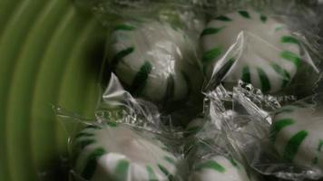 Rotating shot of spearmint hard candies - CANDY SPEARMINT 010 video