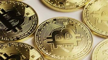 Rotating shot of Bitcoins digital cryptocurrency - BITCOIN 0125 video