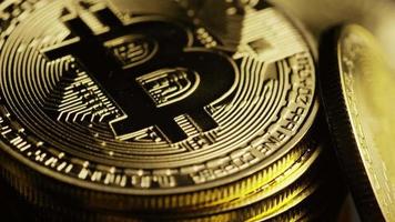 Rotating shot of Bitcoins digital cryptocurrency - BITCOIN 0107 video