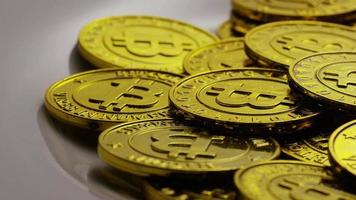 Rotating shot of Bitcoins digital cryptocurrency - BITCOIN 0239 video