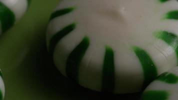 Rotating shot of spearmint hard candies - CANDY SPEARMINT 032 video