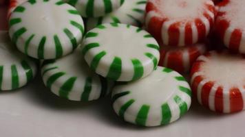 Rotating shot of spearmint hard candies - CANDY SPEARMINT 083 video