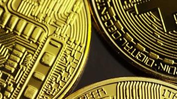 Rotating shot of Bitcoins (digital cryptocurrency) - BITCOIN 0081
