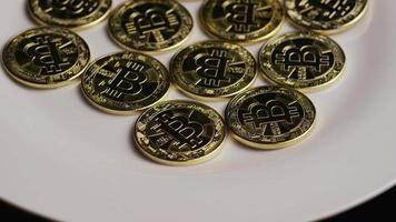Rotating shot of Bitcoins digital cryptocurrency - BITCOIN 0258 video
