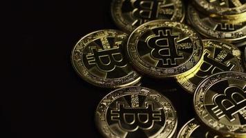Rotating shot of Bitcoins digital cryptocurrency - BITCOIN 0545 video