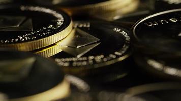 Rotating shot of Bitcoins digital cryptocurrency - BITCOIN ETHEREUM 160 video